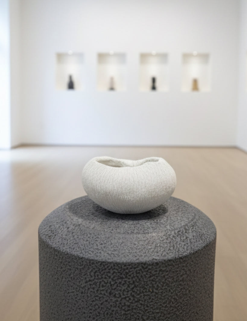 Ceramic vases in white