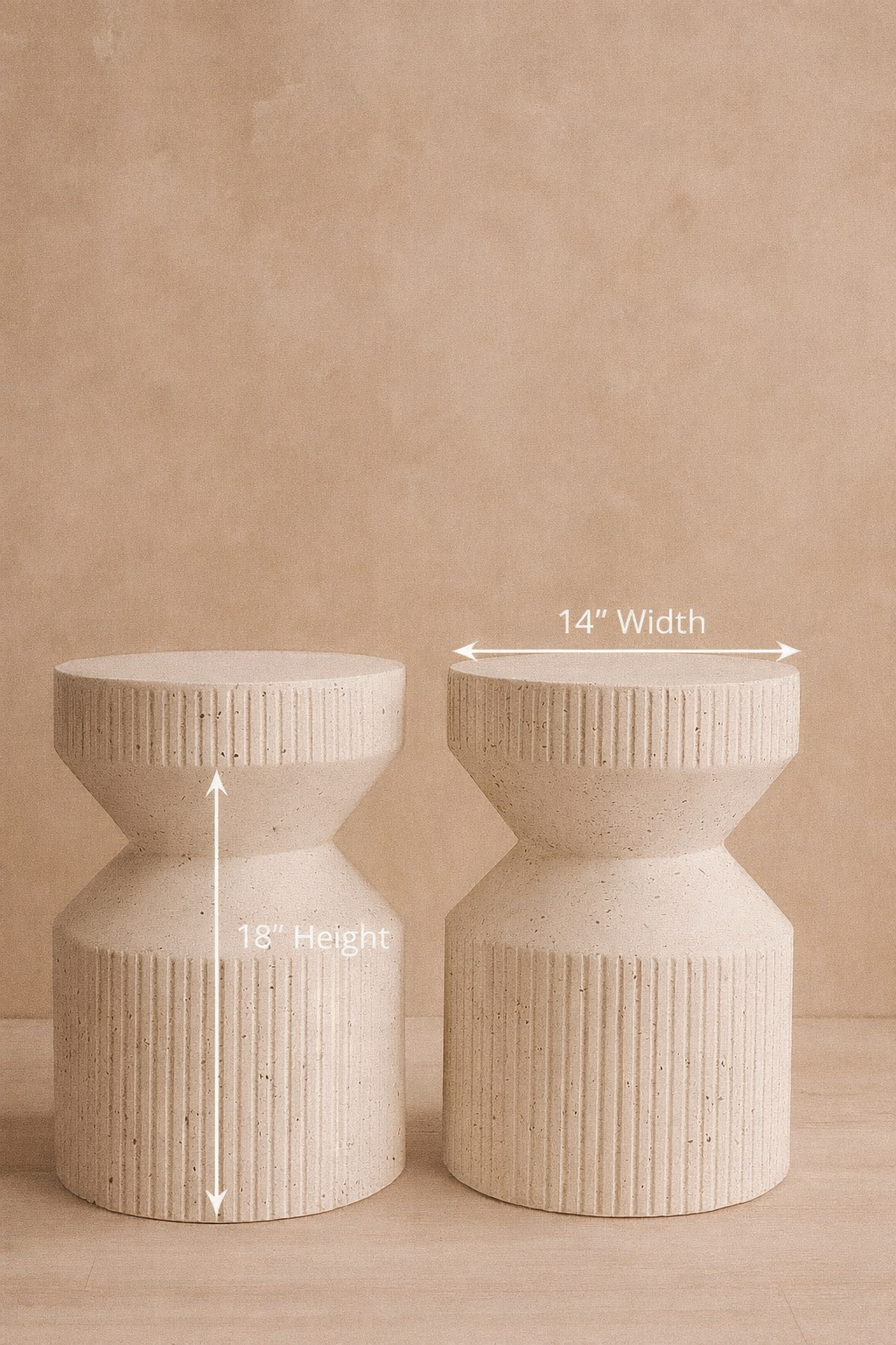 Modern sculptural stools crafted with a textured stone finish, blending minimalist design with timeless durability.